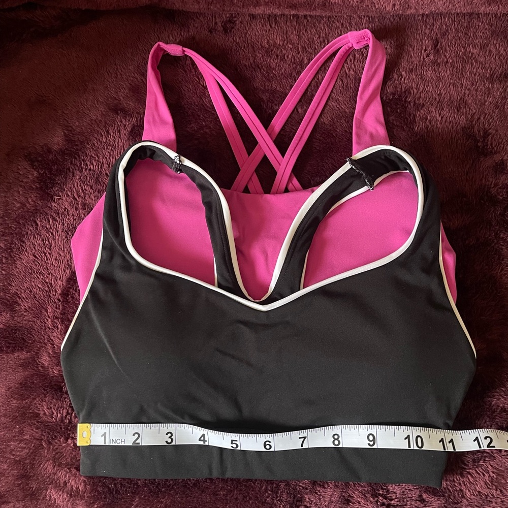Calia sports bras-one pink and one black and white.